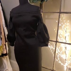 Dress. Stretchy material. Zipper back. New